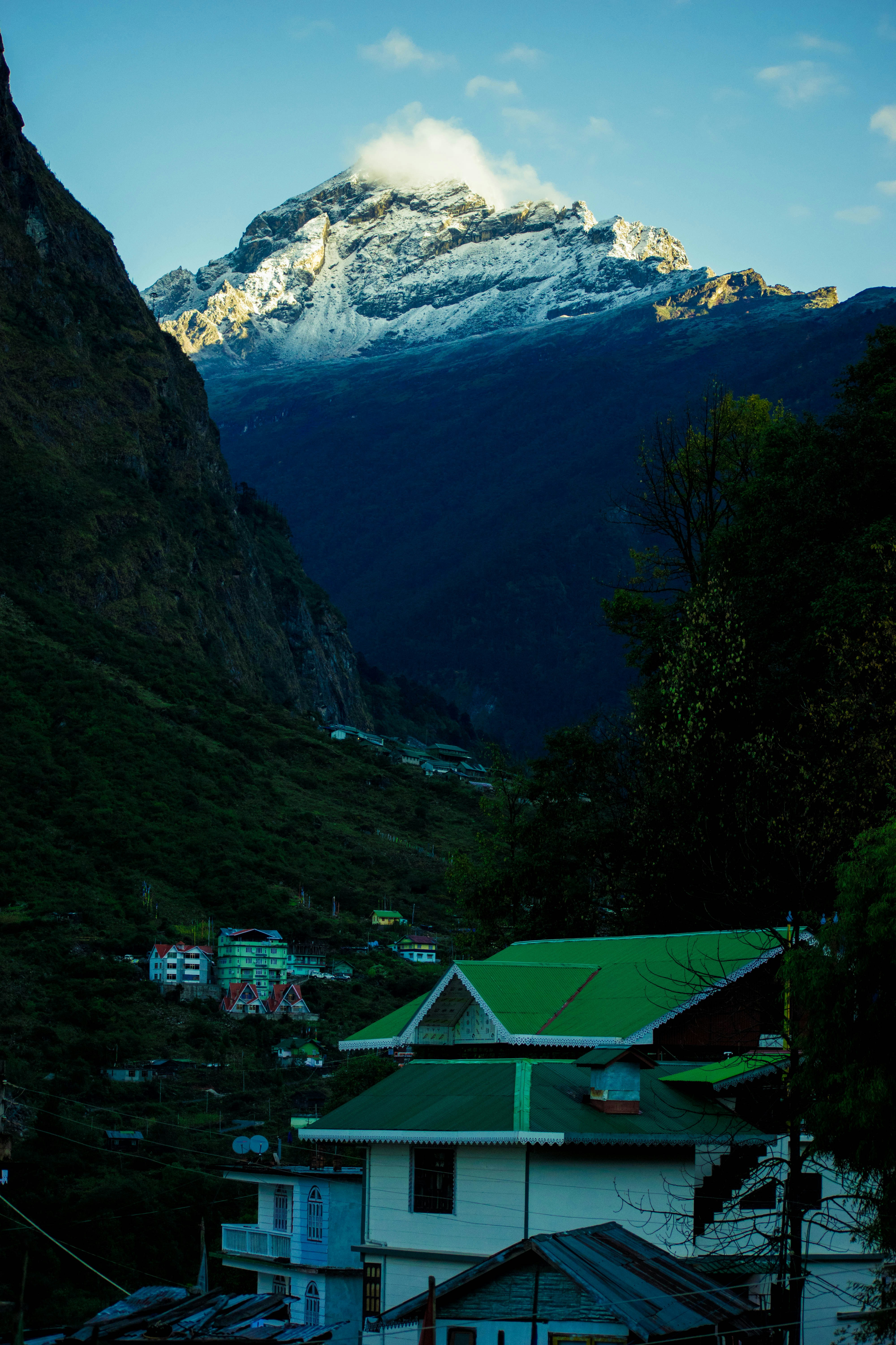 Lachung valley with cascading waterfalls and pine forests